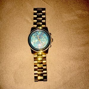 Michael Kors gold watch with aqua blue face